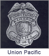 Union Pacific Railroad Police Old West Law Enforcement Badges. These replica badges are cast from a tin and zinc alloy, using molds made from the original, authentic badge, and has a pin soldered on the back. Special care and attention has been given to retaining every minute detail of the original badge. Copyright milnejewelry.com.