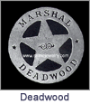 Marshall Deadwood Old West Law Enforcement Badges. These replica badges are cast from a tin and zinc alloy, using molds made from the original, authentic badge, and has a pin soldered on the back. Special care and attention has been given to retaining every minute detail of the original badge. Copyright Milne Jewelry Company.