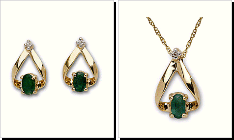 Oval Emerald and Diamond Earrings in 14 Karat Gold Setting.